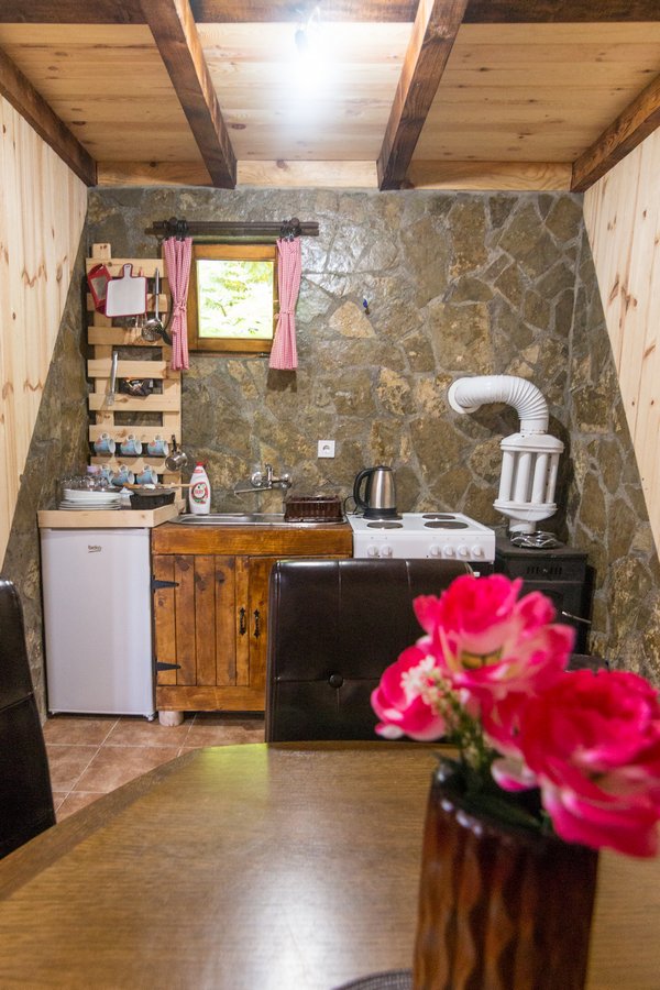 Kitchen with stove and sink