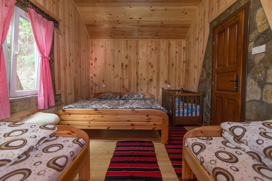 Family bedroom with baby cot