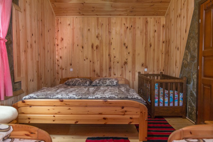 Double bed and cot close-up