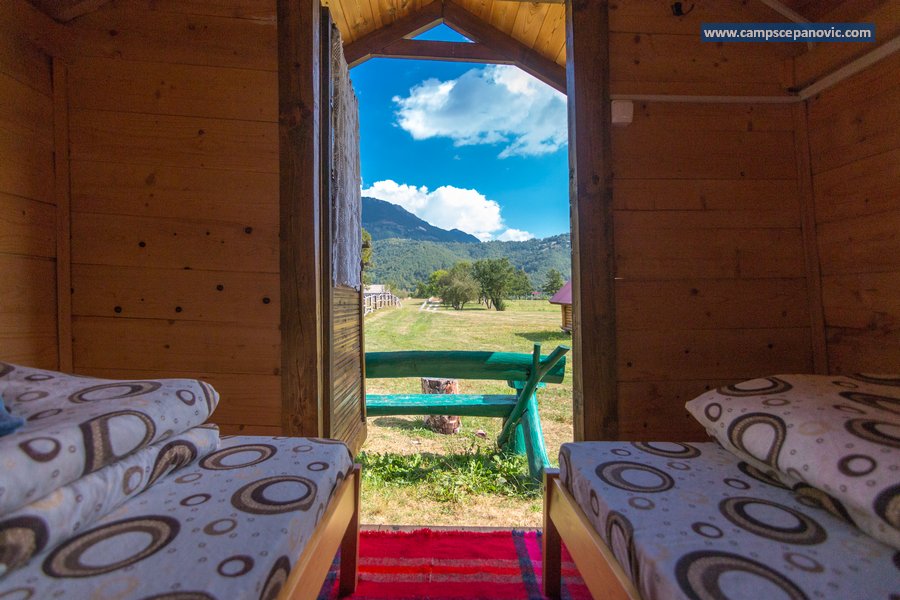 View from inside a cabin toward the mountains