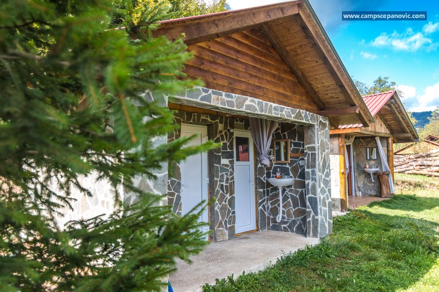 Stone and wood bathroom building exterior